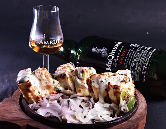 MaQintosh Malai Paneer Tikka: The mild and creamy notes of Malai Paneer Tikka is infused with MaQintosh that lends softness to the paneer. Rs 299