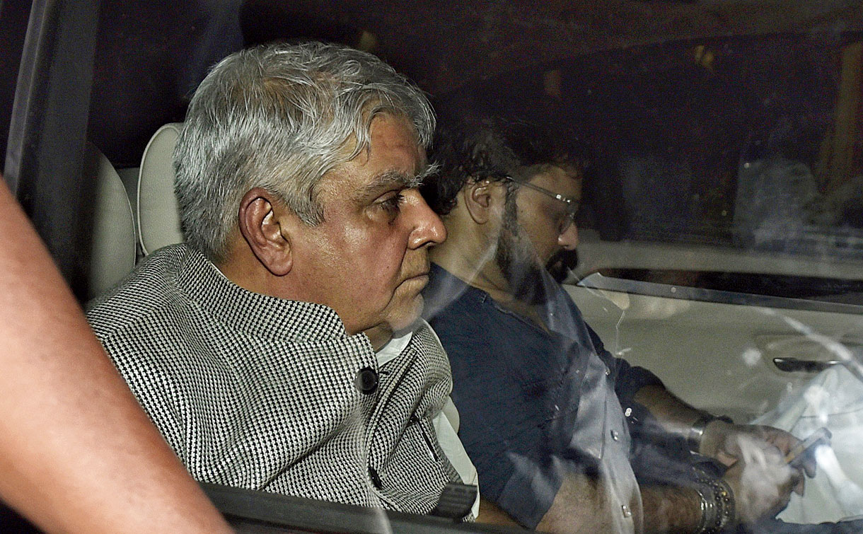 Governor Dhankhar and minister Supriyo in the governor’s car. 