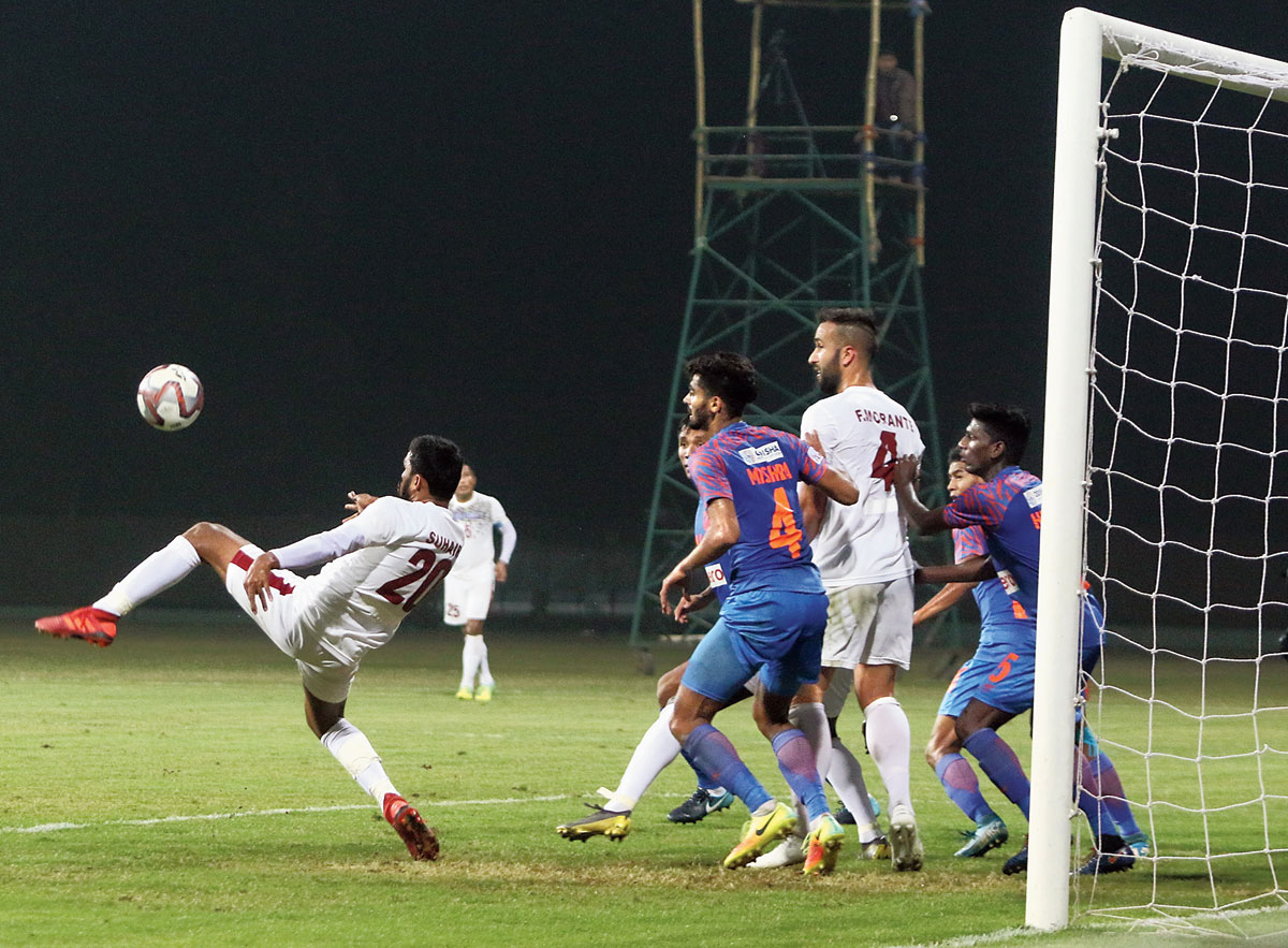 Mohun Bagan’s VP Suhair (left) attempts a shot at Indian Arrows goal during an I-League match at the Kalyani Stadium on Thursday
