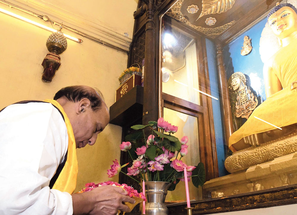 Union minister Rajnath Singh prays to Lord Buddha at the Mahabodhi Mahavihara in Bodhgaya on Saturday. 