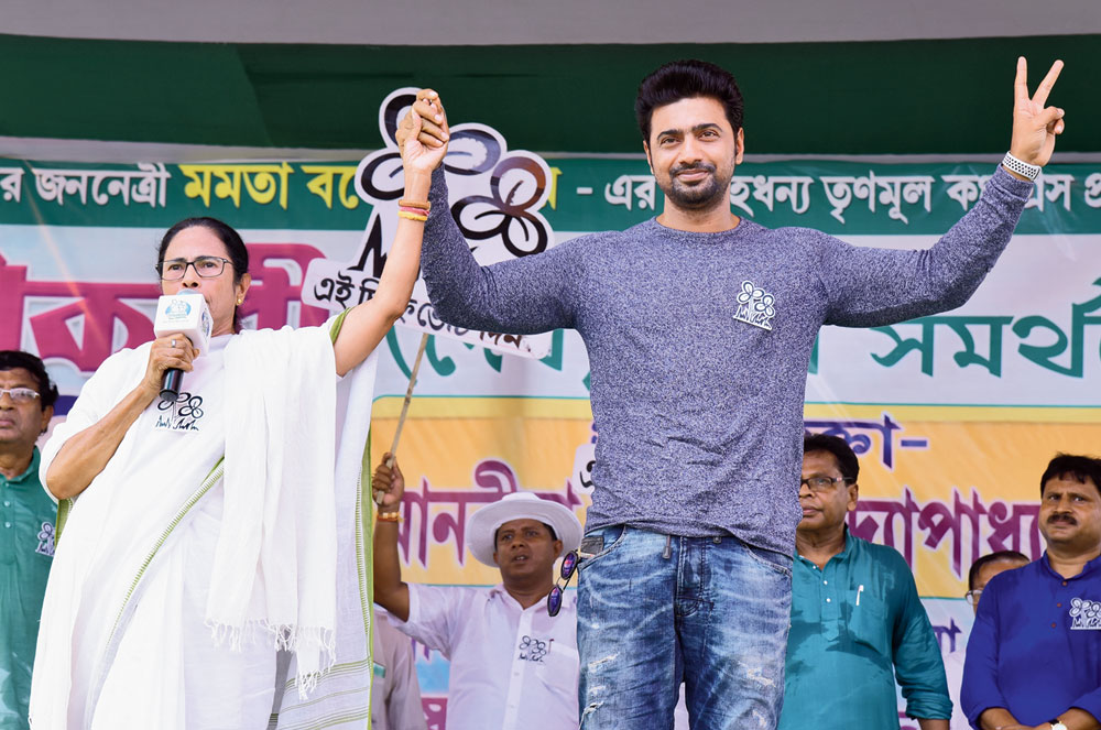 Mamata with Ghatal Trinamul candidate Dev at a meeting in Debra on Wednesday.