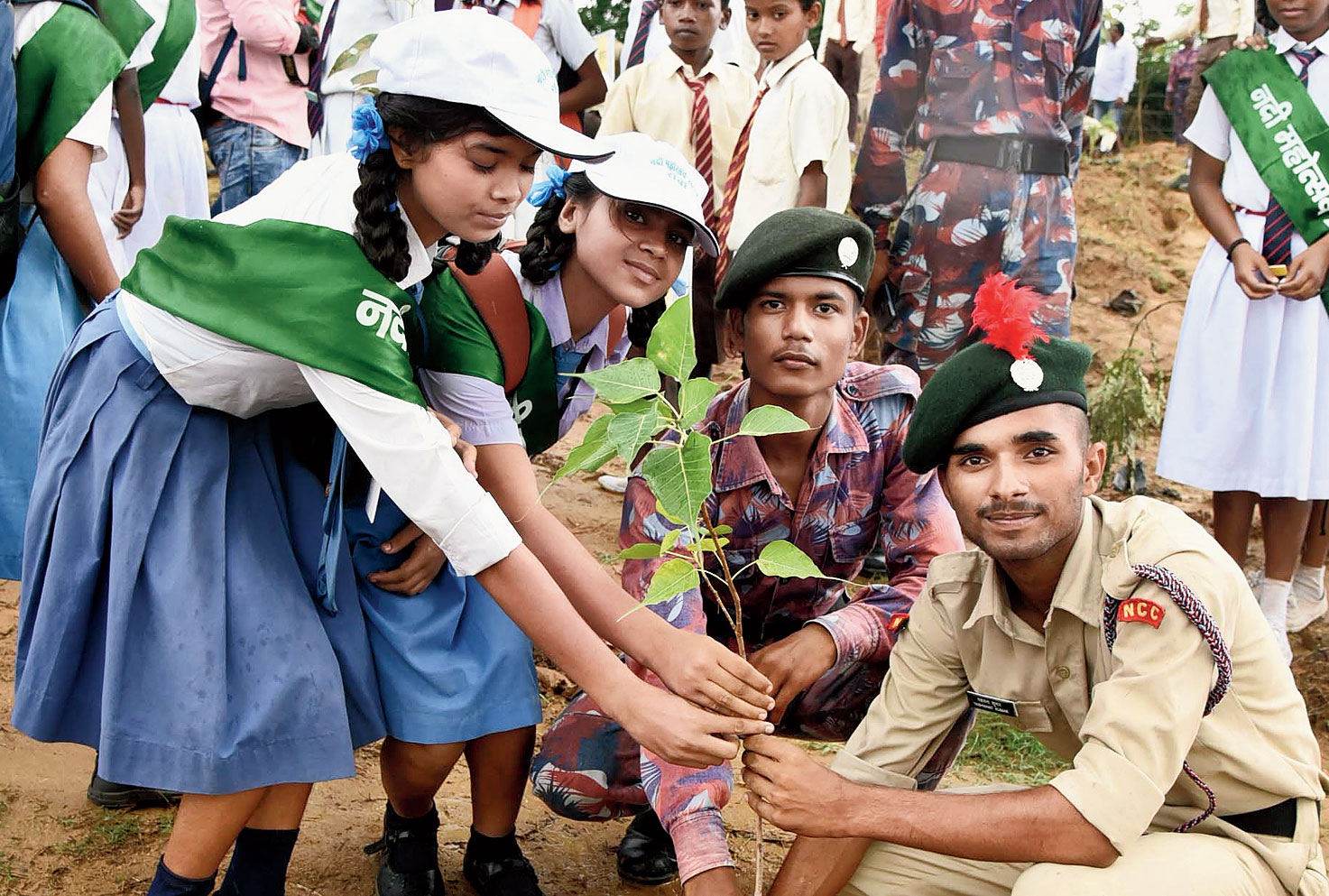 Students and NCC cadets plant saplings at Vammahotsav-cum-Nadi Mahotsav event on the banks of the river Jumar in Boreya, Ranchi, on Sunday.