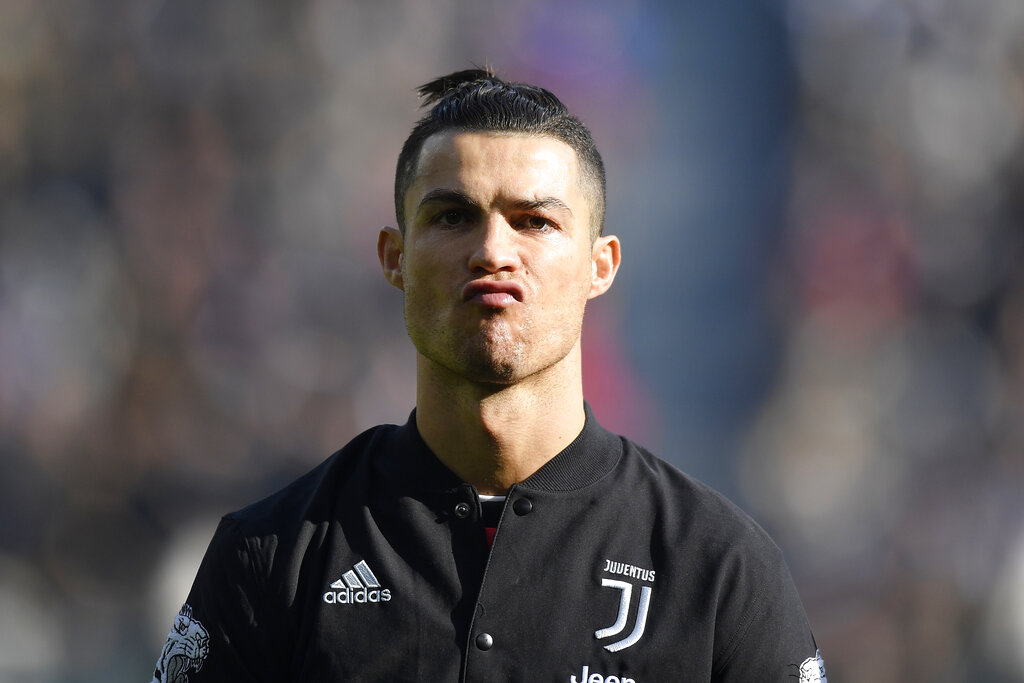 Juventus' Cristiano Ronaldo plays during a Serie A soccer match between Juventus and Fiorentina, in Turin, Italy, on Sunday