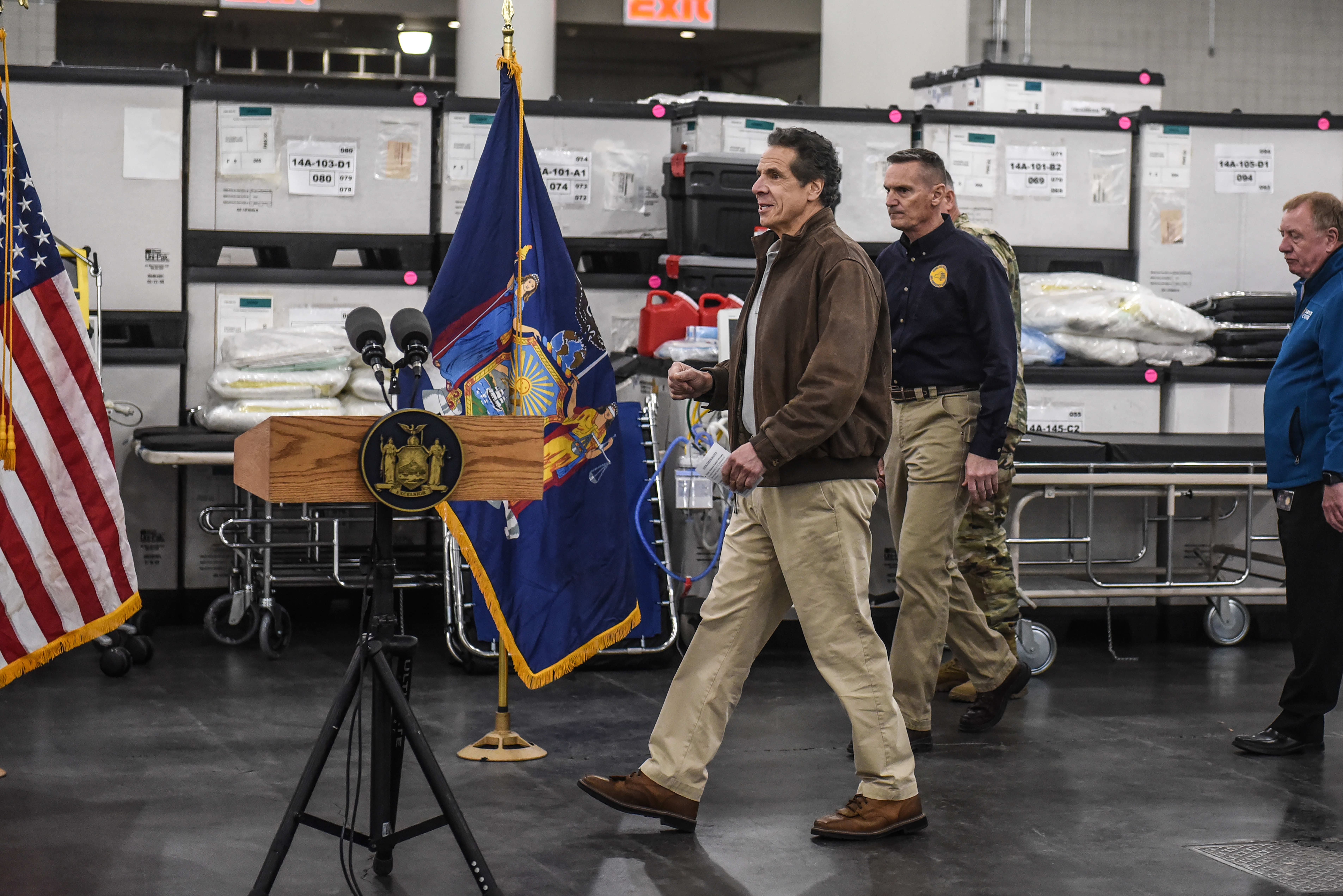 New York Gov. Andrew Cuomo prepares for a news conference at the Javits Center in New York, Tuesday, March 24, 2020, where the Army Corps of Engineers is turning the convention center into a 1,000-bed emergency hospital. With his coronavirus briefings, Gov. Andrew Cuomo has emerged as an authoritative voice in the crisis.