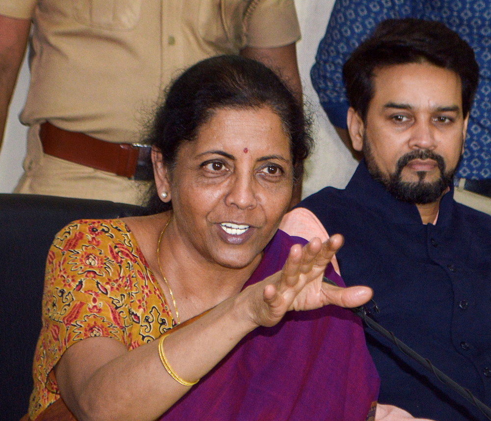 Finance Minister Nirmala Sitharaman along with Minister of State Anurag Thakur addresses a press conference in Pune, Tuesday, August 27, 2019.