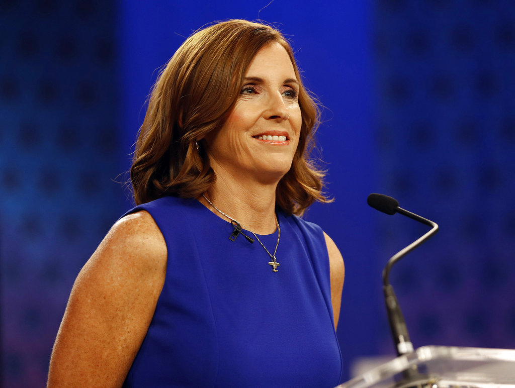In this October 15, 2018, file photo, Martha McSally goes over the rules before a televised debate with Kyrsten Sinema in Phoenix.