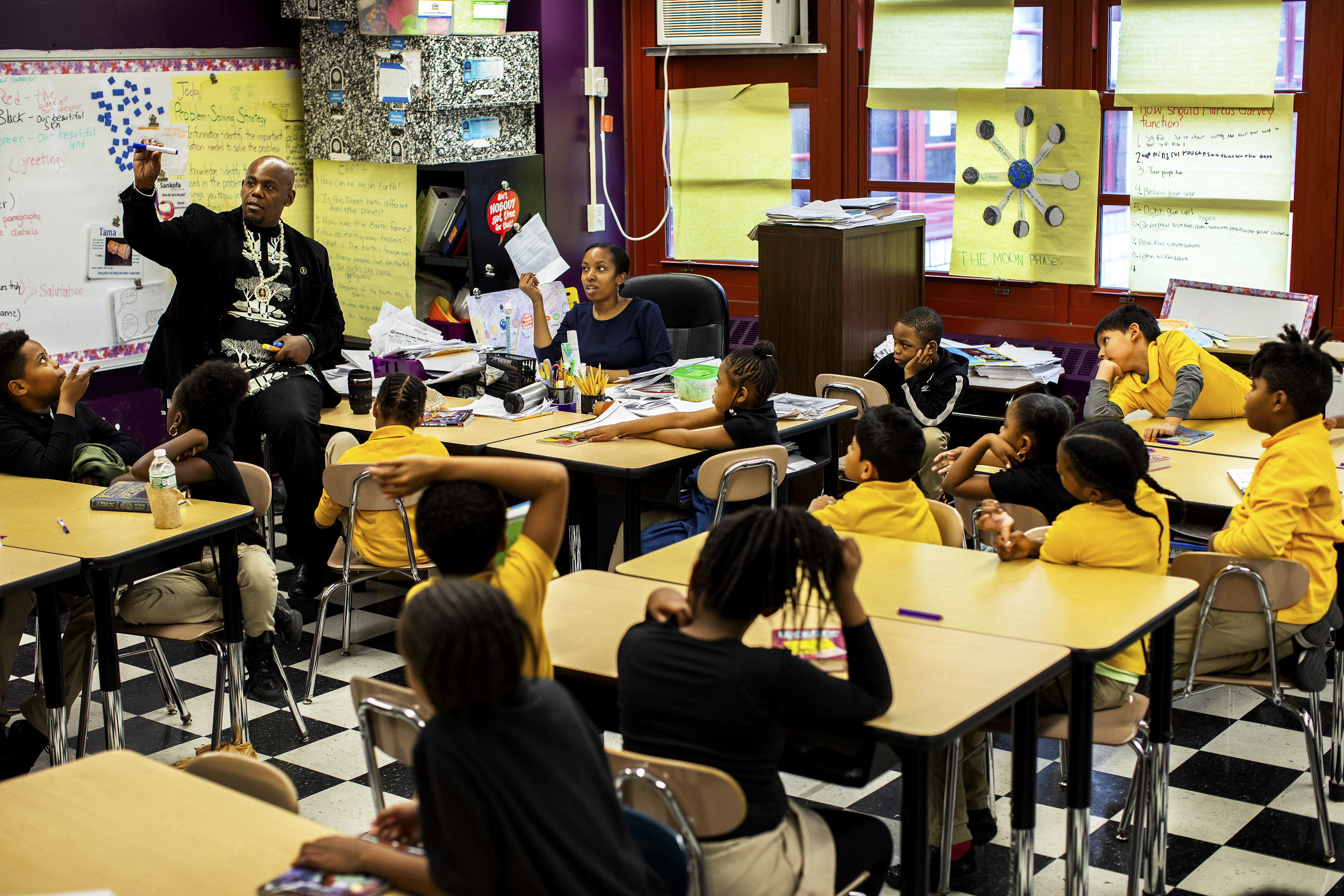 Rafiq Kalam al-Din II, the founder of Ember Charter School, teaches a class in Brooklyn. The New York Times