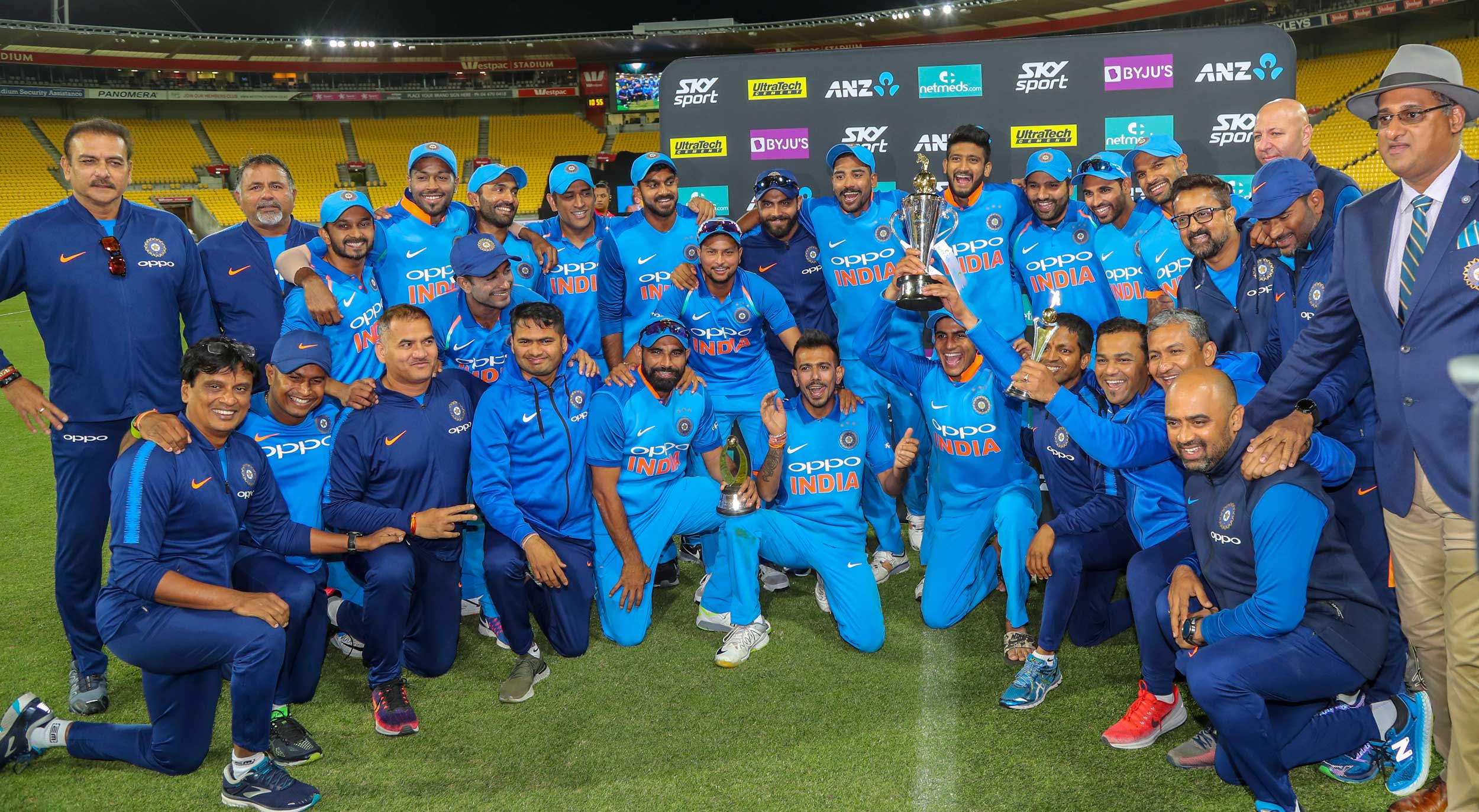Indian players celebrate with the series trophy after beating New Zealand their fifth ODI at Westpac Stadium in Wellington, New Zealand, on Sunday. 