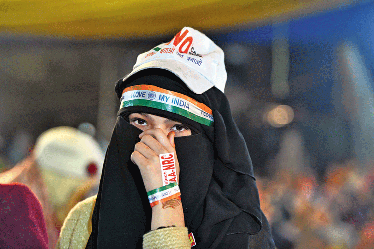 A woman participates in a demonstration against Citizenship (Amendment) Act and NRC at Shaheen Bagh in New Delhi