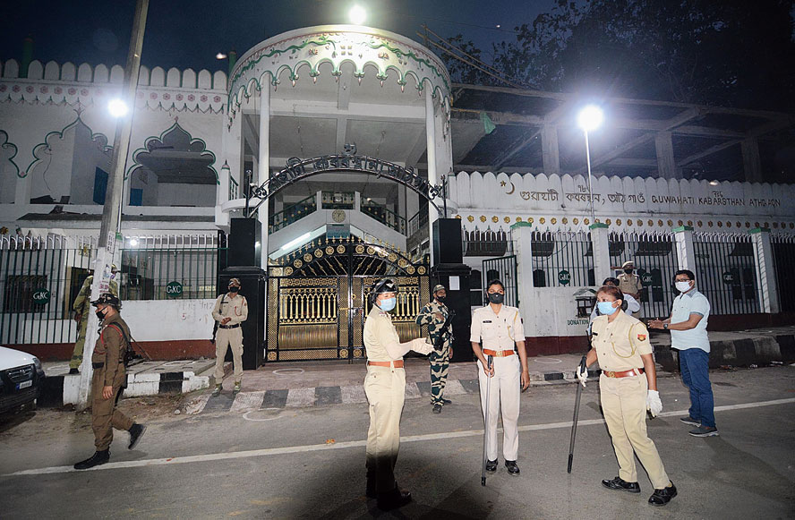 Security personnel keep vigil outside the Athgaon Kabarstan Masjid after it was sealed on Friday. 

