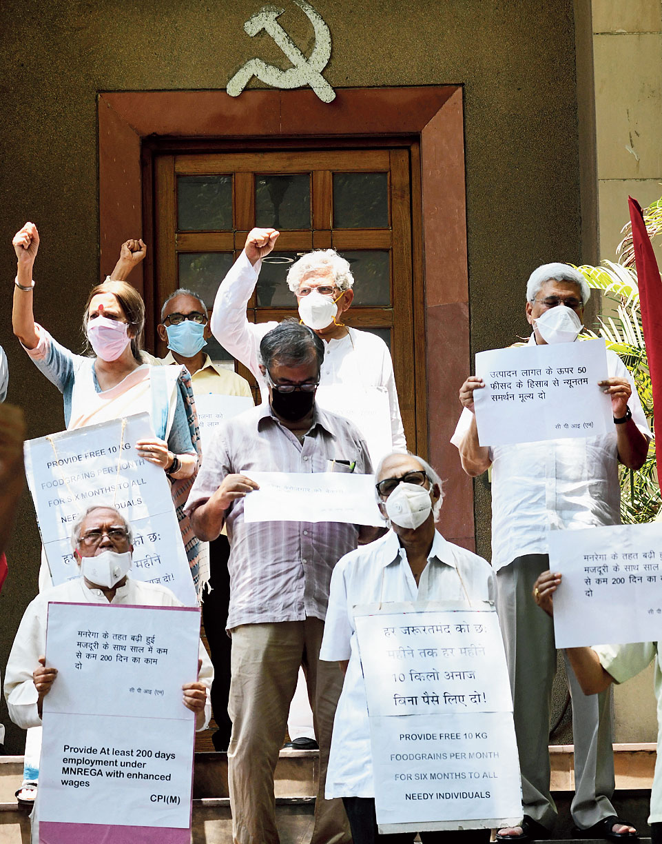 CPM general secretary Sitaram Yechury, party leaders Brinda Karat, Prakash Karat and others protest in New Delhi on Tuesday.