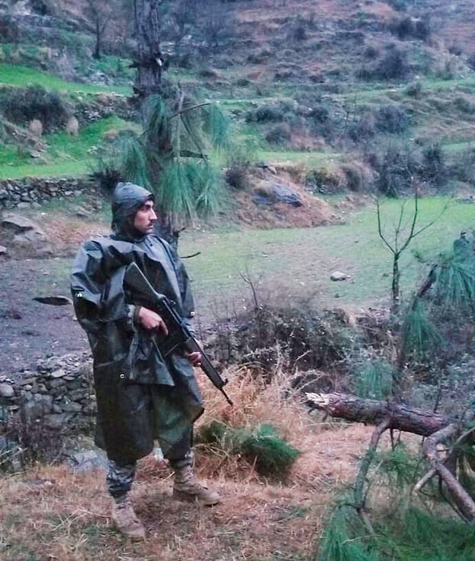 A Pakistani soldier stands guard after the Balakot air strike on February 26, 2019.