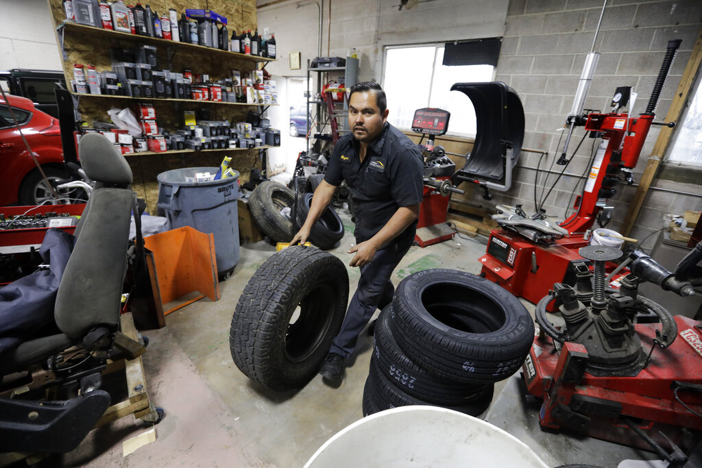 Mechanic Miguel Borrayo works on a car in Ogden, Utah. Borrayo tried to find a lawyer to help him argue he should be allowed to stay in the country with his American-born children, despite lacking legal papers. But he was told it would cost up to $8,000 and he didn’t have a strong case. He was given a month to leave the country.