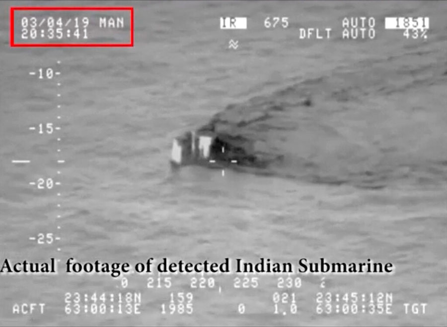 In this image made from video taken on March 4, 2019, and released on Tuesday, March 5, 2019, by the Pakistan Military, shows what they claim is an Indian submarine approaching its territorial waters in the Arabian Sea.