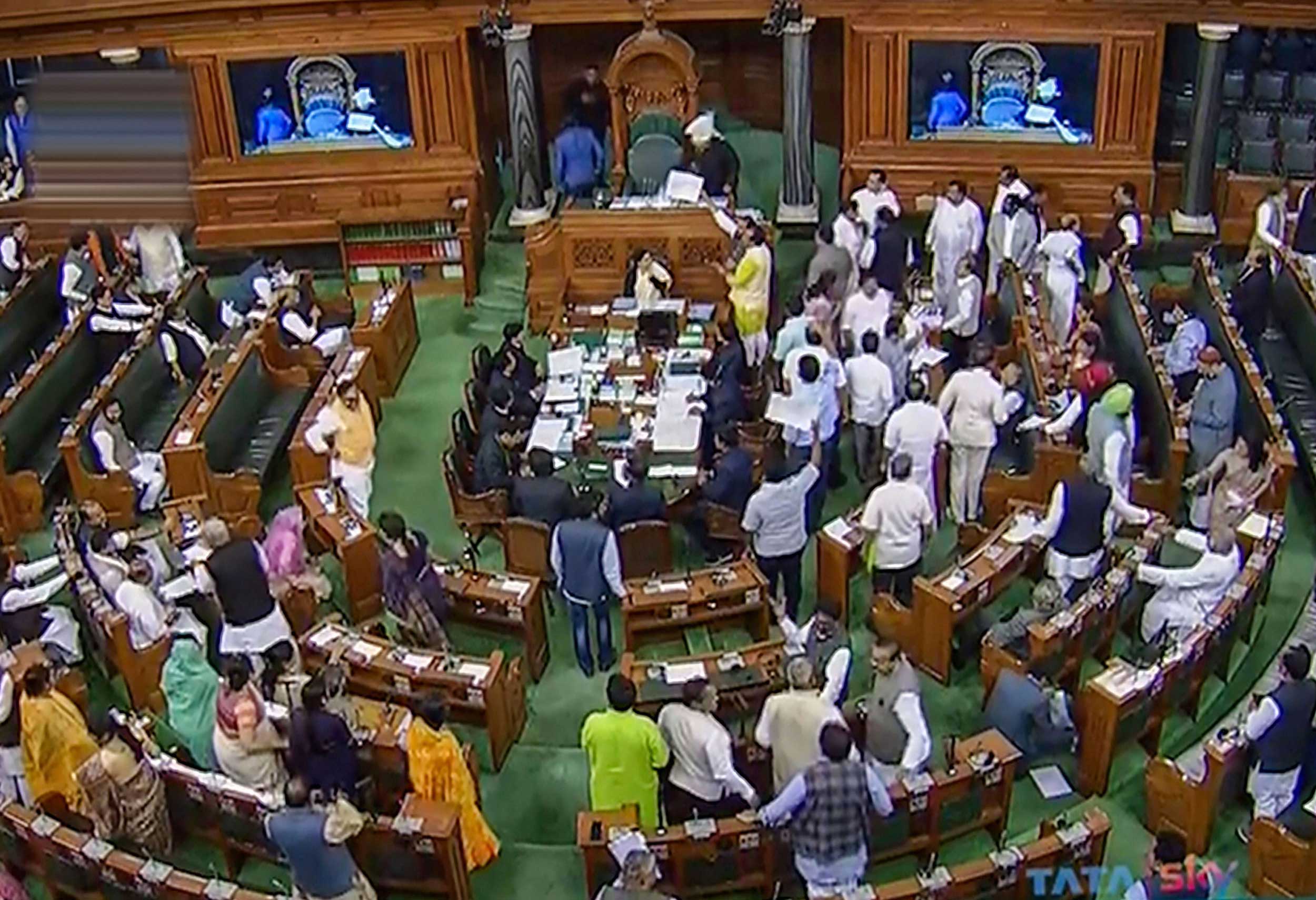 Opposition leaders protest in the Lok Sabha during the Budget Session in New Delhi on Monday.