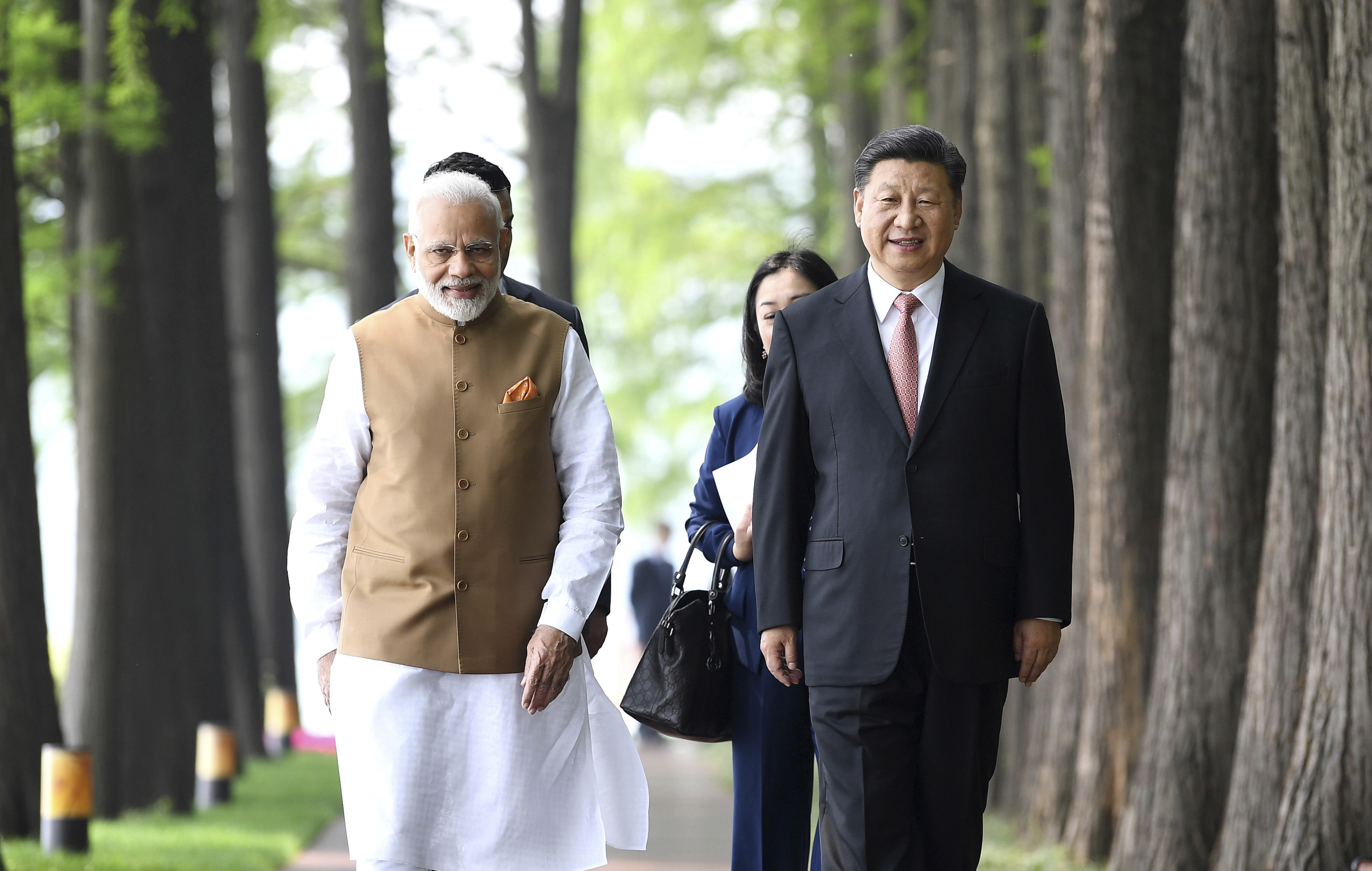 Narendra Modi (left) and Xi Jinping in Wuhan in April 2018. Engaged in a bitter trade war with the US, China needs greater access to the Indian market