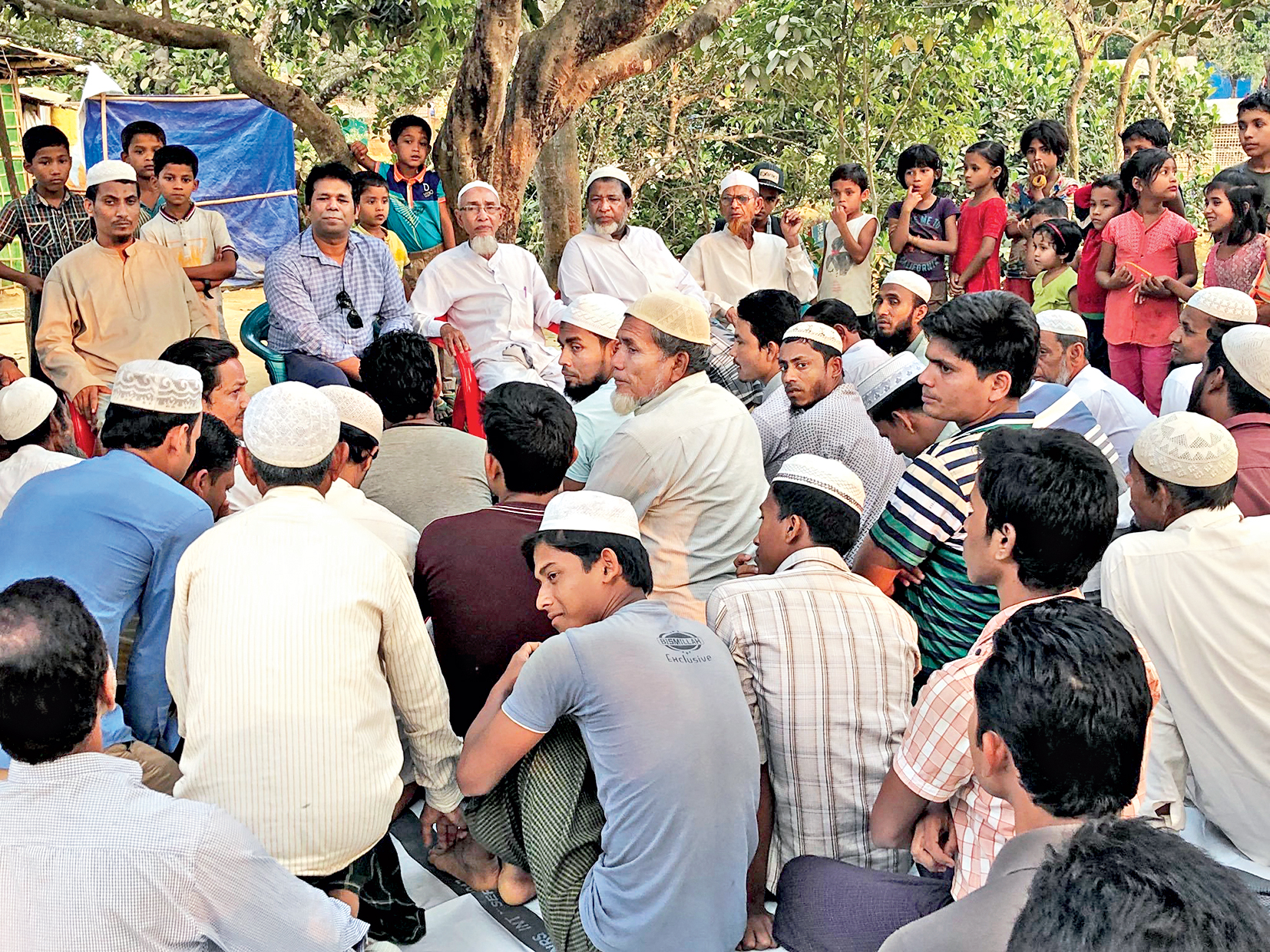 Tun Khin with Rohingya leaders at a refugee camp in Bangladesh