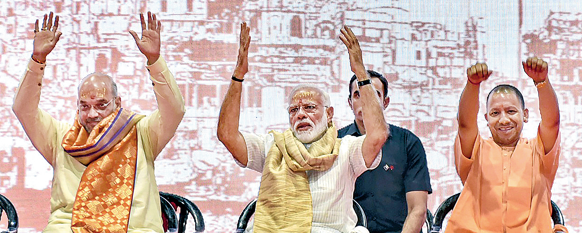 Prime Minister-elect Narendra Modi, BJP chief Amit Shah and Uttar Pradesh chief minister Yogi Adityanath during a meeting with BJP workers in Varanasi on Monday.
