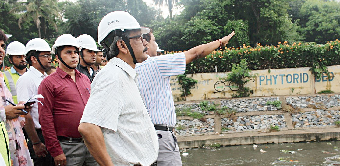 Urban development secretary Ajoy Kumar Singh (gesturing with hand) inspects the Harmu riverbank near Radisson Blu in Ranchi on Tuesday. 
