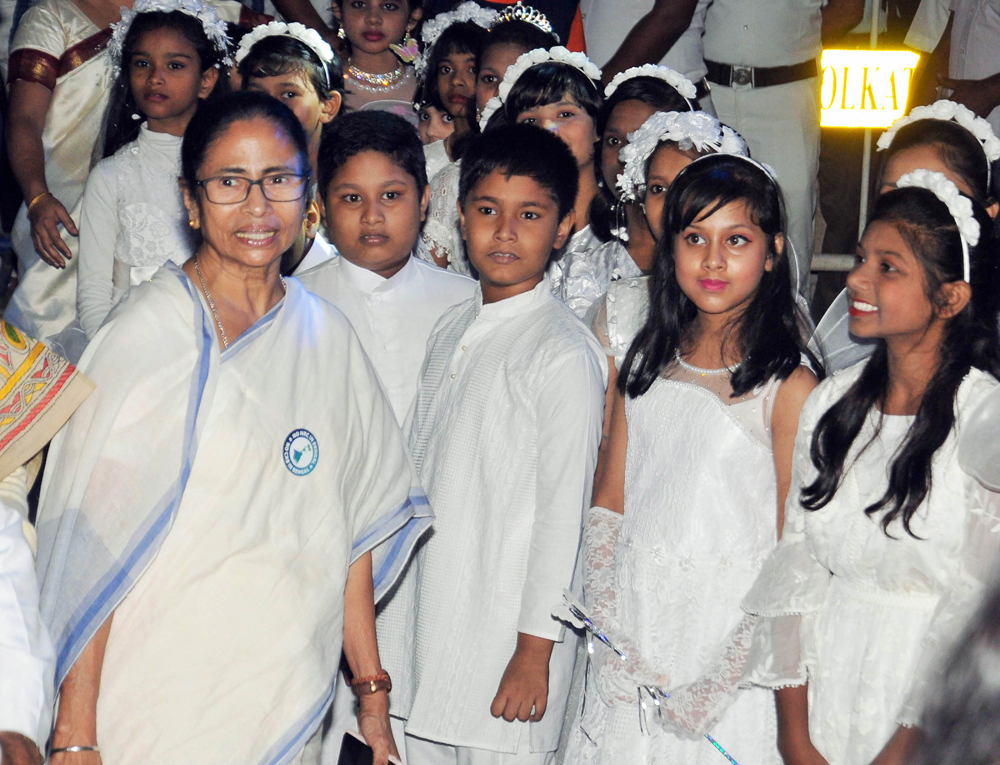 Bengal chief minister Mamata Banerjee with children during the inauguration of Christmas celebrations in Calcutta on December 16