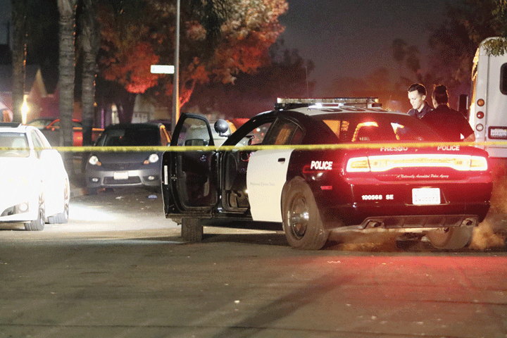 A police car at the scene of the shooting in Fresno.