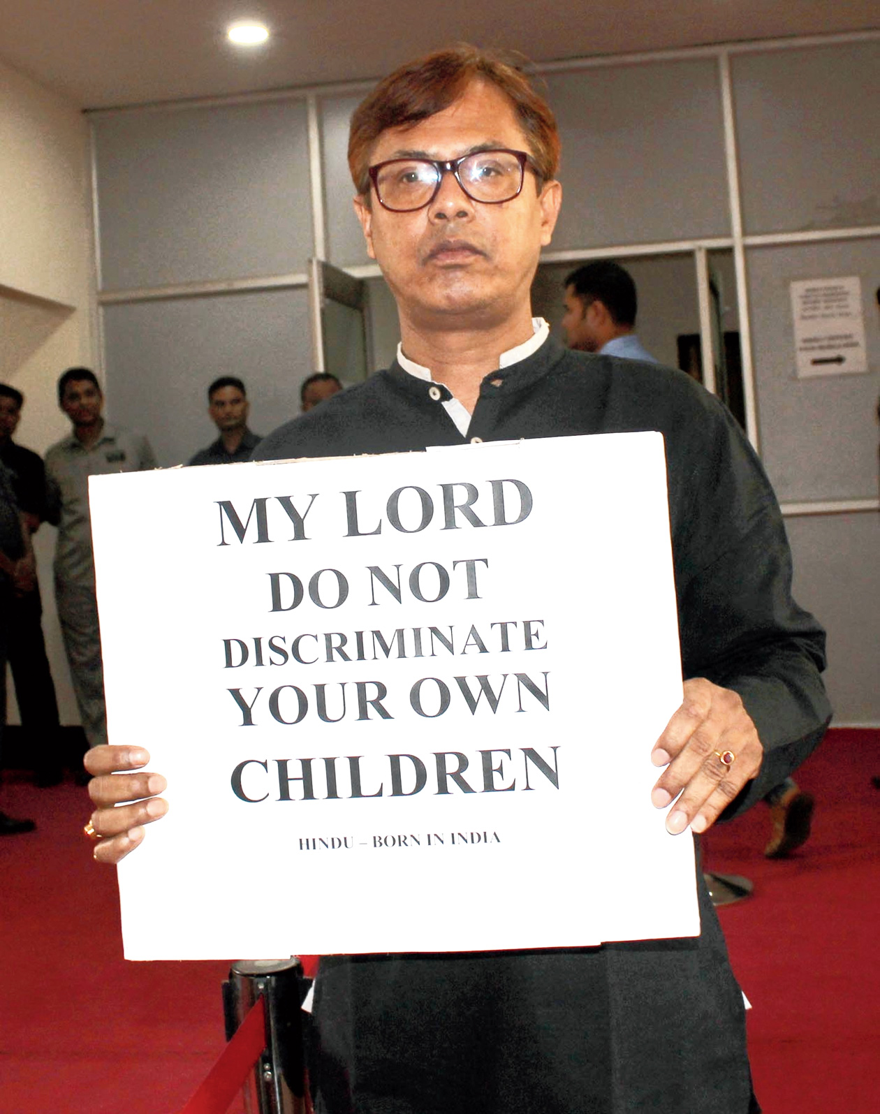 MLA Shiladitya Dev protests outside the Assembly.