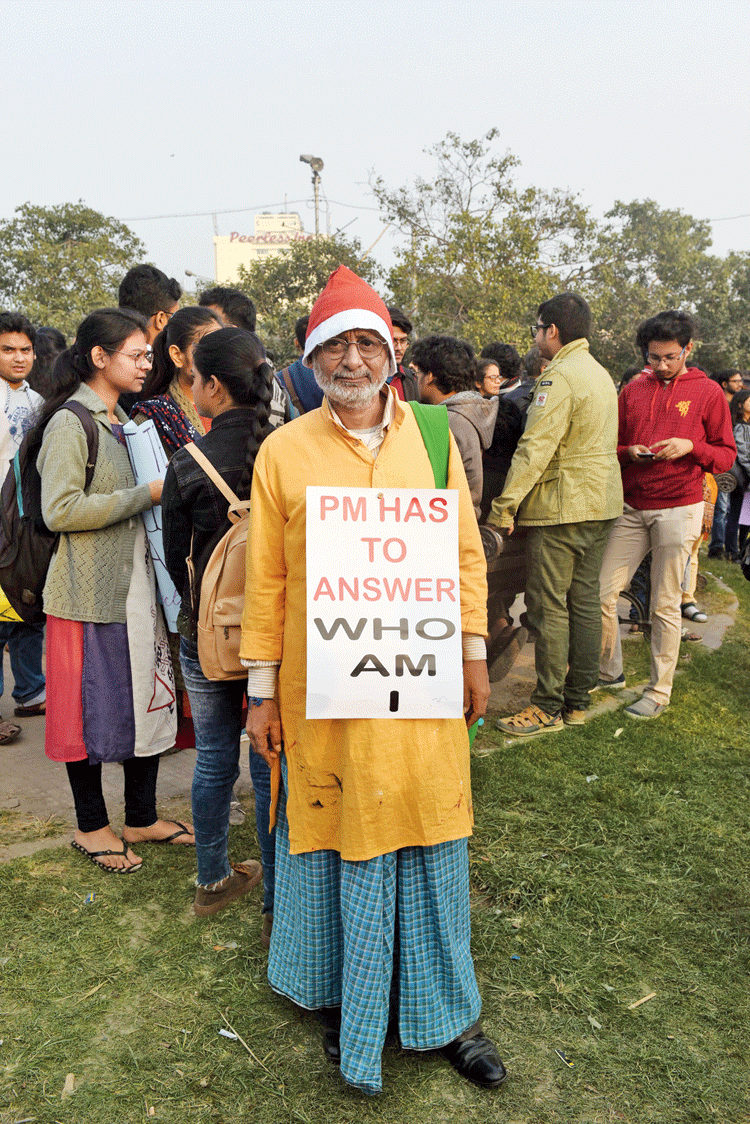 Abhijit Mitra, 60, was clad in a Santa cap, a saffron kurta and a lungi. “My name Joseph Narendra Mohammad,” he kept saying. The three elements of his attire, each associated with a religion, was a dig at Prime Minister Narendra Modi who had said that protesters could be identified by their clothes