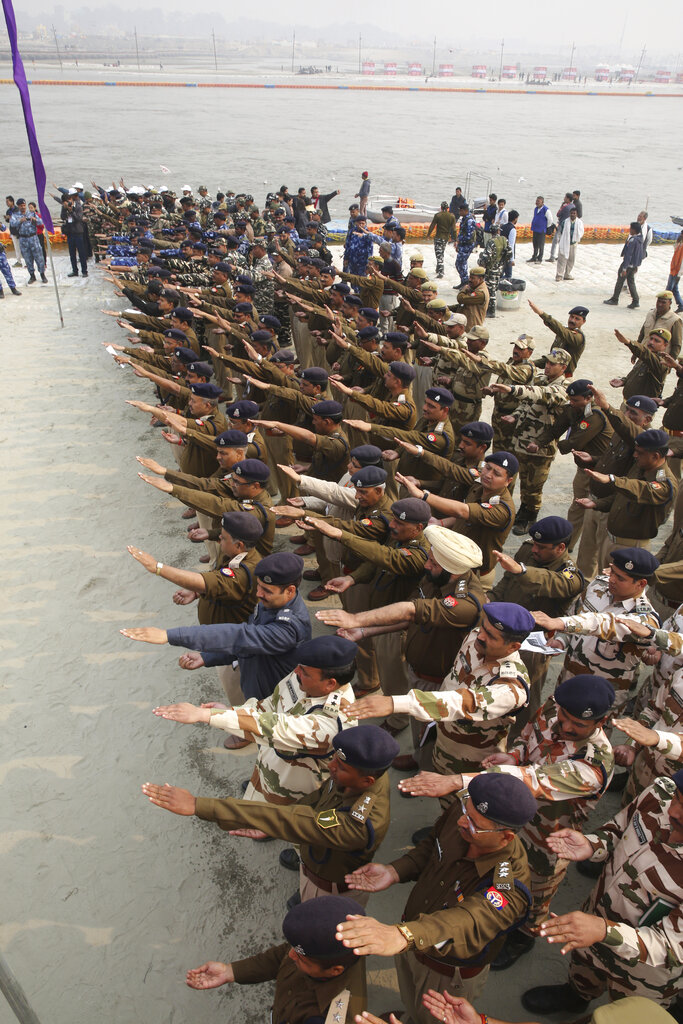 Security personnel take oath to execute their duties honestly after offering prayers at the Sangam. For this year's Kumbh, the government shelled out more than Rs 400 crore, hoping to impress voters ahead of the general elections this year and draw visitors from around the world.