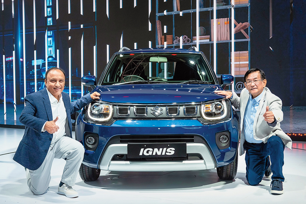Kenichi Ayukawa (right) with the new Ignis in Greater Noida on Friday