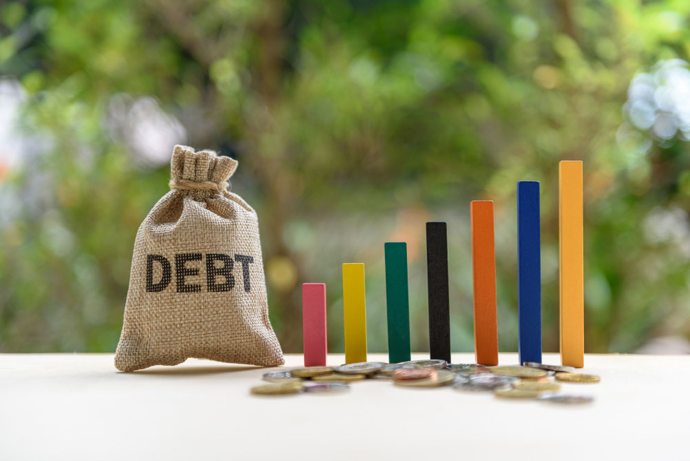 The burden of past debt is forcing the Bengal government to raise its market borrowings to Rs 53,774 crore from Rs 47,854 crore last year as the state plans to pay off Rs 56,183.16 crore of past debts, which include Rs 25,032 crore of the principal amount and Rs 31,151.16 crore as interest.
