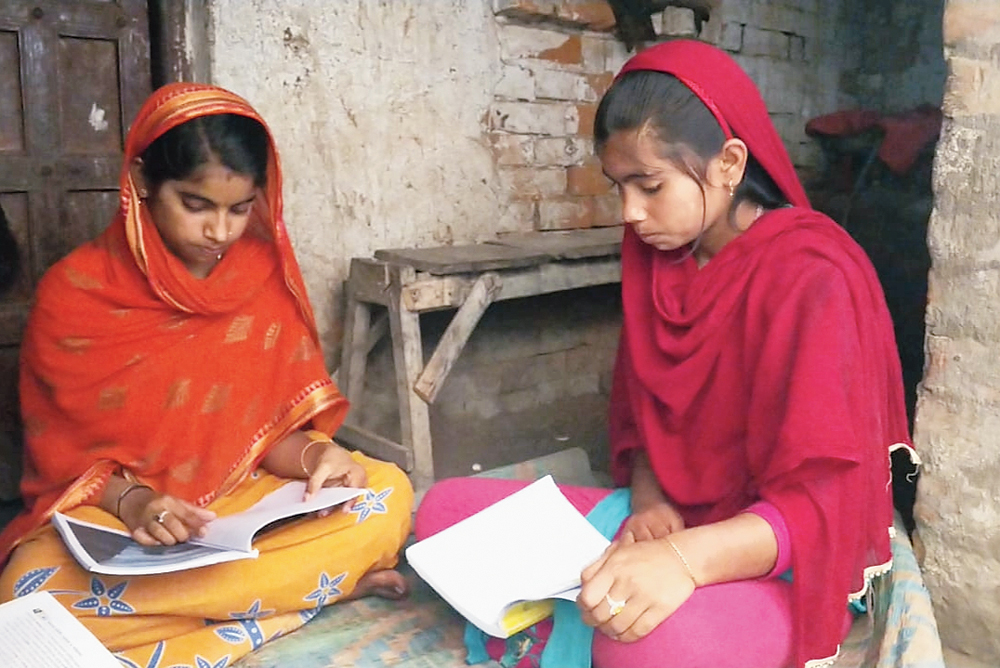 Sisters Tunjela and Unjela Khatun prepare for the Madhyamik examination at Shibnagar village in Samserganj on Tuesday