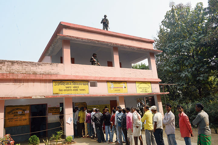Voters queue up at Utkramit Madhya Vidyalaya in Palna.