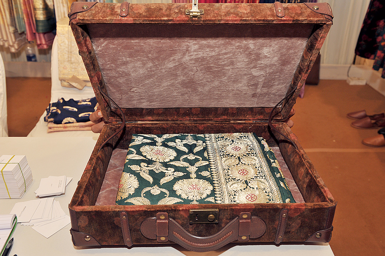 This is how Kshitij Jalori packages his classic saris. An Ajmer boy based out of Delhi, Kshitij is a textile designer and painter who launched his label in end-July and got mashru, prints, saris, jackets, kurtas, pants, suits, leather footwear, and pashmina brocades in cashmere to Wedding Diaries.