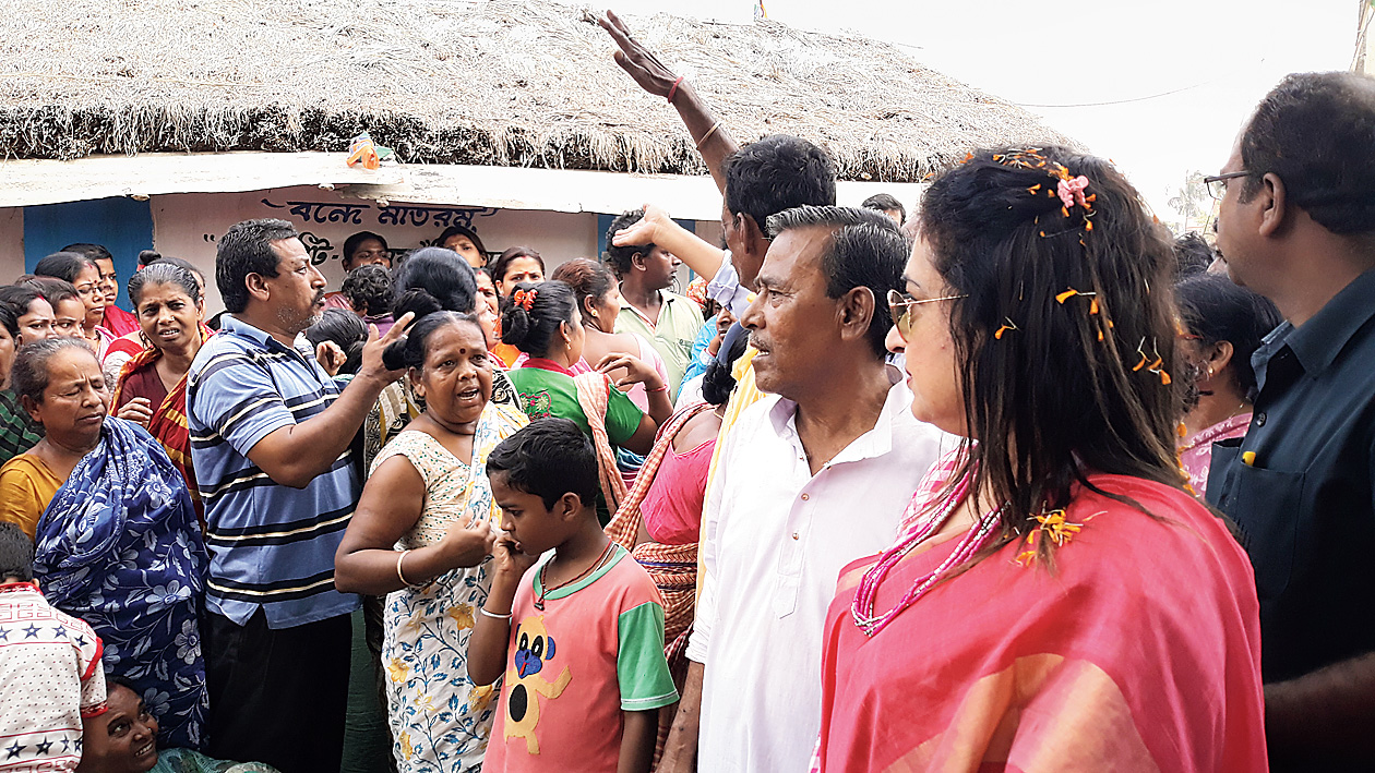 Residents of Hatzanbazar agitate in front of Satabdi Roy.
