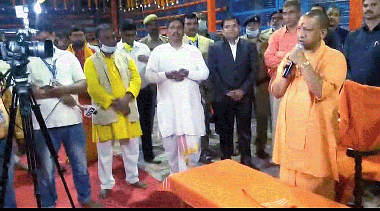 Chief minister Yogi Adityanath ignores social distancing guidelines as he addresses the gathering in Ayodhya during the lockdown on Wednesday