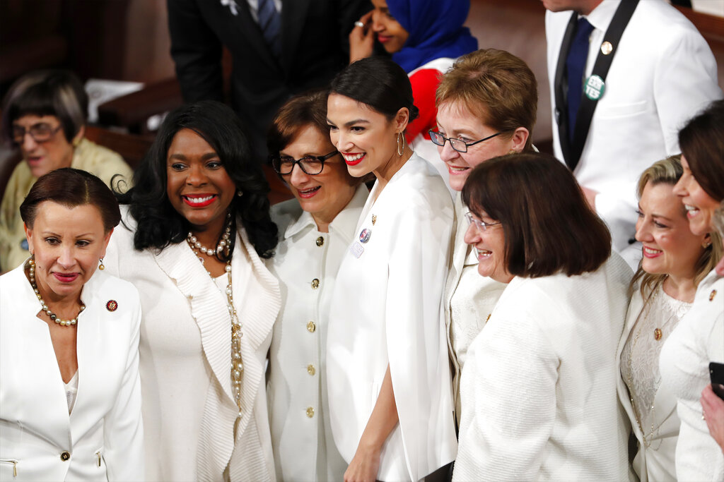 Democratic members of Congress, including Alexandria Ocasio-Cortez (centre), pose for a photo before Donald Trump delivered his State of the Union address.