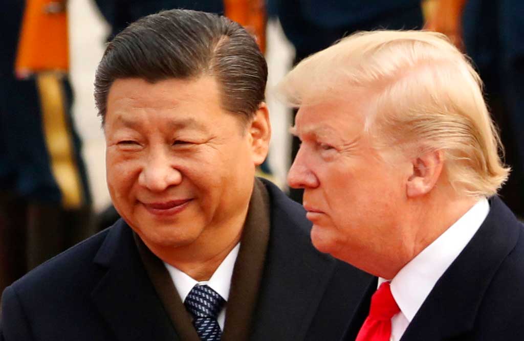 The handshake between Xi Jinping (left) and Donald Trump pauses what was becoming a headlong race toward economic conflict.