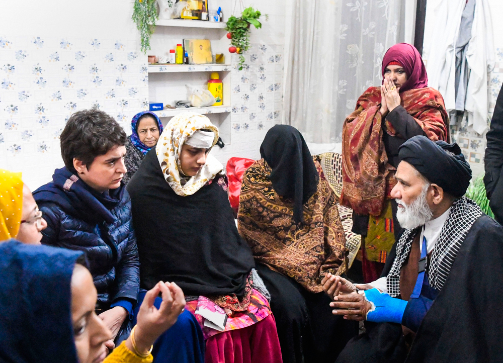 Priyanka Gandhi Vadra with Ruqaiya Parveen, whose house was allegedly ransacked by police during violence that erupted following anti-CAA protests, in Muzaffarnagar on January 4