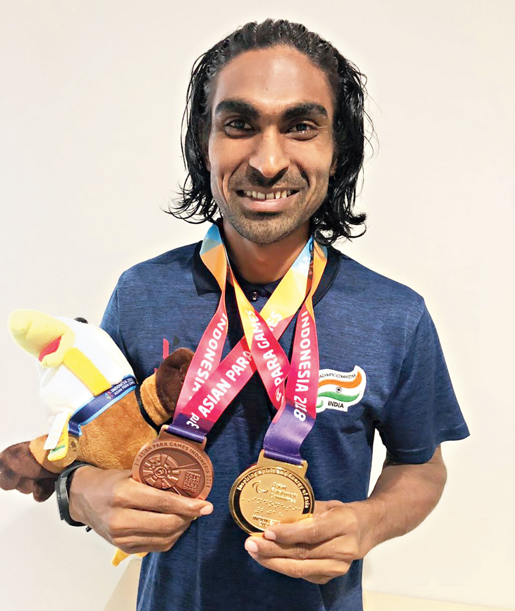 Pramod Bhagat with his medals. 
