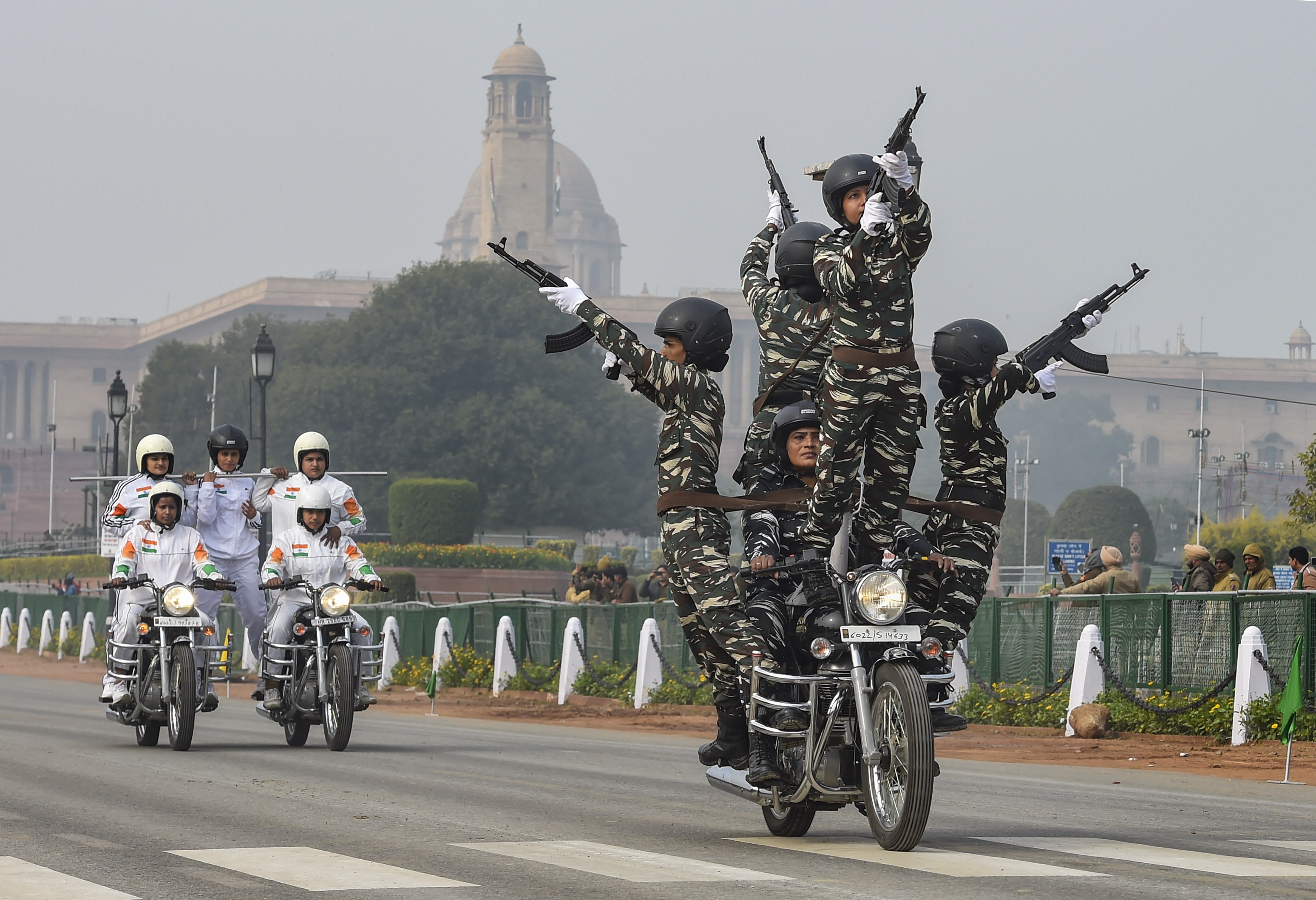 Border Security Force Daredevils motorcycle stunt team during the rehearsals for the upcoming Republic Day parade at Rajpath in New Delhi, Monday, January 20, 2020.