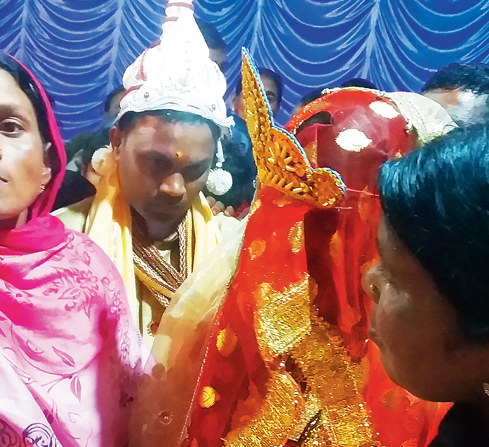 Swapnna and Poonam Tanti at their wedding at Daisajan tea estate in Tinsukia district. 
