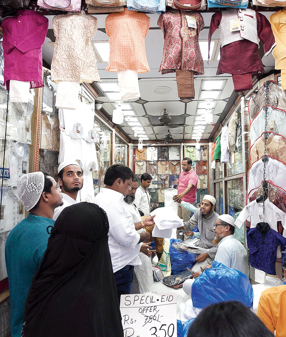 Shoppers near Nakhoda Masjid on Tuesday