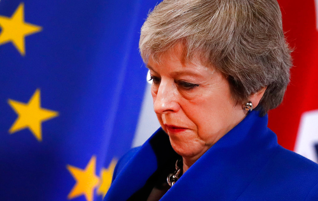 EU accepts Brexit deal, May seeks support