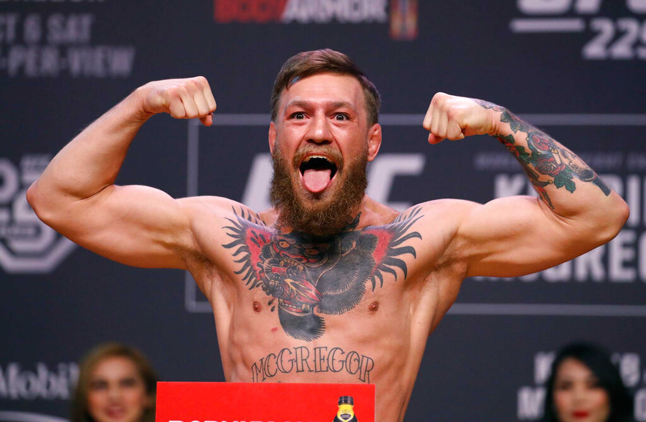 Conor McGregor poses during a ceremonial weigh-in for the UFC 246 mixed  martial arts bout, Friday, Jan. 17, 2020, in Las Vegas. McGregor is  scheduled to fight Donald 