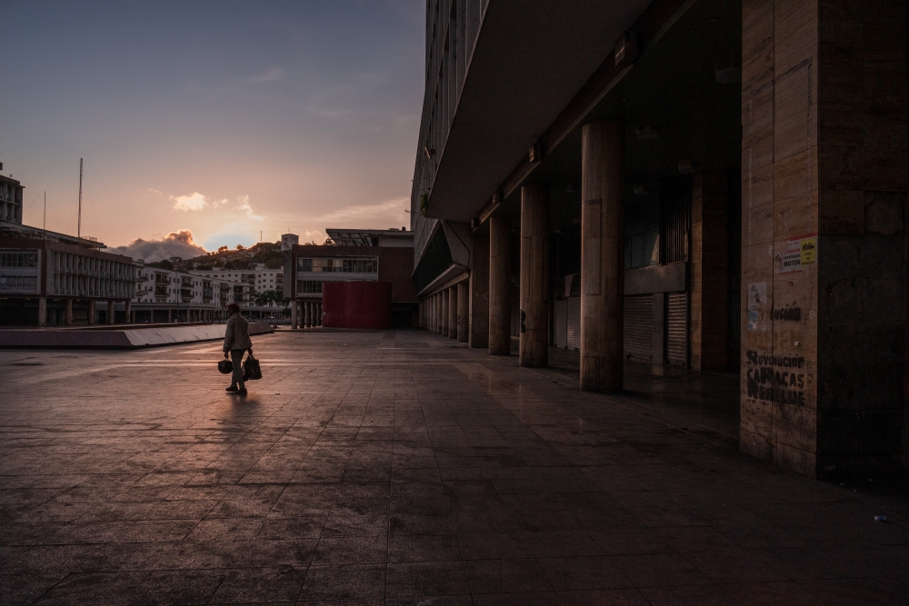 A man walks in a popular square in downtown Caracas, Venezuela, on March 17, 2020