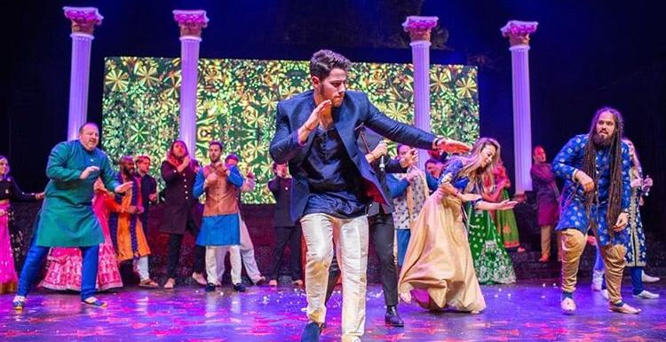 Nick Jonas's outfit at the Sangeet ceremony.  We see Priyanka and Nick as the ultimate love story