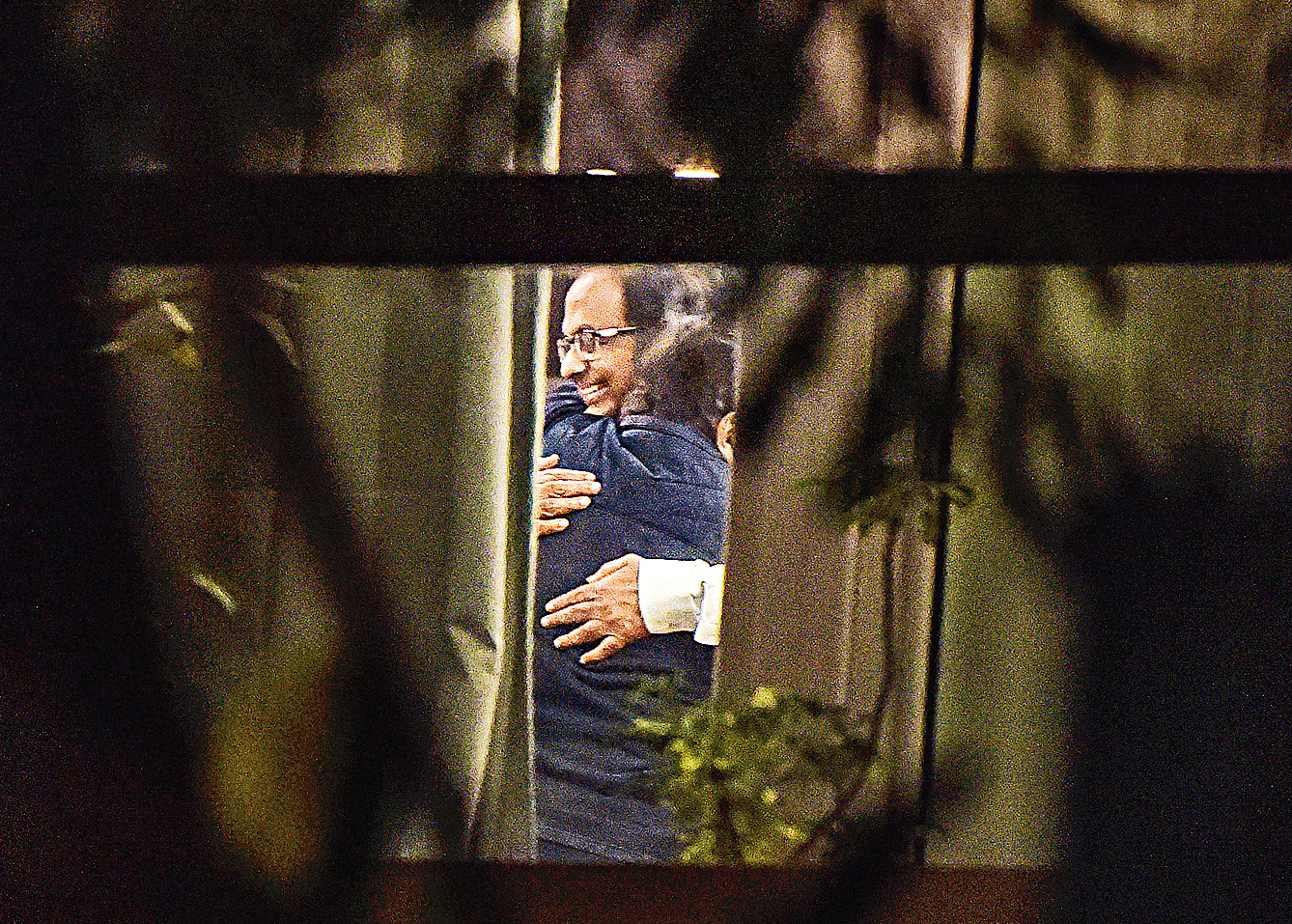 Congress leader Ahmed Patel embraces Chidambaram at his residence in New Delhi on Wednesday. 