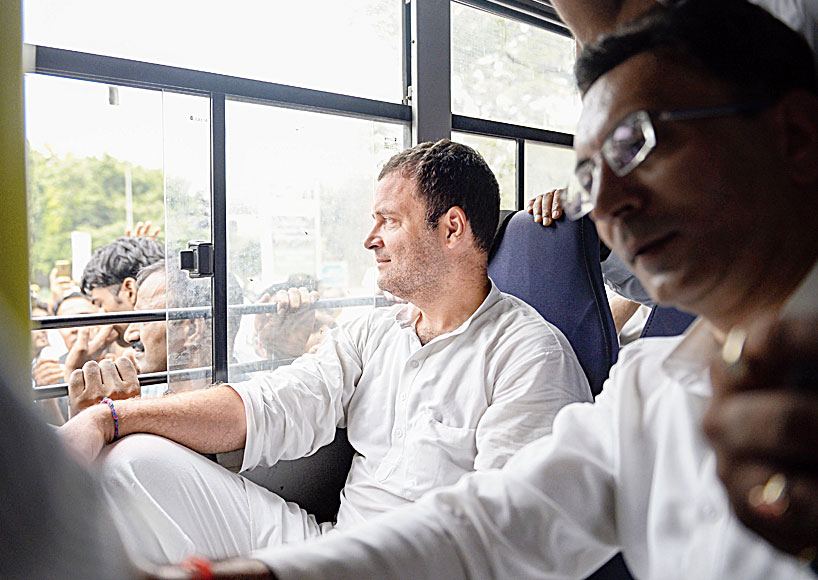 Rahul in a bus after being detained by police outside the CBI office.
