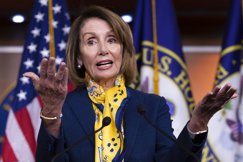 Nancy Pelosi talks to reporters a day after officially postponing President Donald Trump's State of the Union address until the government is fully reopened, at the Capitol in Washington on Thursday.