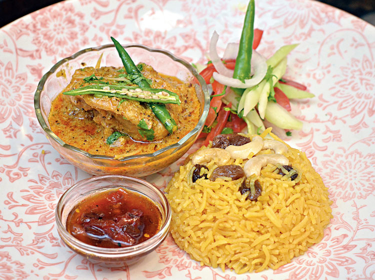 Pabna Murgi, Basanti Pulao, Tomato Khejurer Chutney, Crunchy Mixed Salad by Taj Bengal: Executive chef Sonu Koithara highlighted the tie between East and West Bengal with the Pabna Murgi using a Bangladeshi recipe and the favourite yellow pulao from this side of Bengal. The traditional Bengali tomato and date sweet chutney ended the meal on a sweet note.